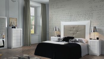 Dormitorio con pared blanca texturizada